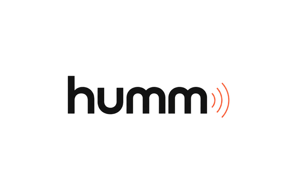 The logo for 'humm' is shown in black lowercase letters with three red curved lines on the right, centered on a white background